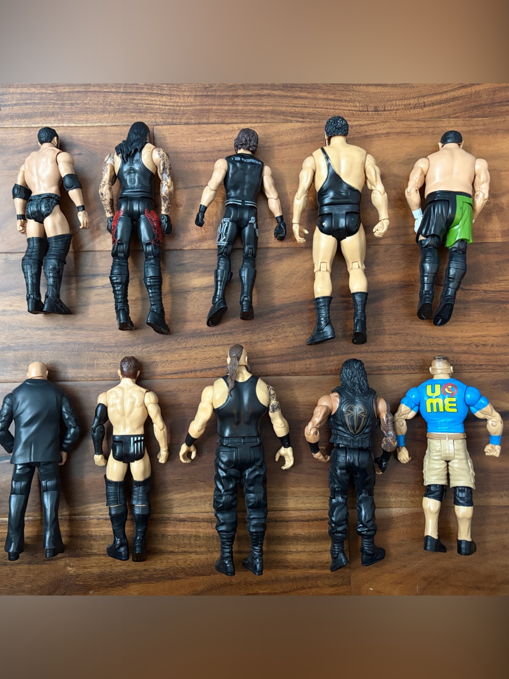 Mattel WWE Wrestling Action Figures in Black, Tan, Blue